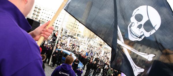 Supporters of the web site 'The Pirate Bay', one of the world's top illegal filesharing websites, demonstrate in Stockholm (file) Supporters of the web site 'The Pirate Bay', one of the world's top illegal filesharing websites, demonstrate in Stockholm (file) - Sputnik International