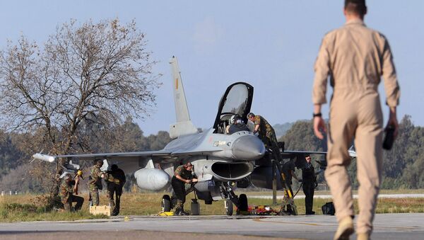 A Belgian pilot walks toward his F-16 fighter jet at Araxos airport in Kato Ahaia, Greece. - Sputnik International