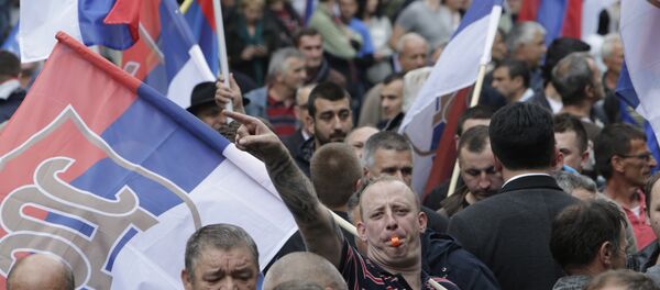 Bosnian Serb people waves flags during a demonstration in Banja Luka, Bosnia, on Saturday, May 14, 2016 Bosnian Serb people waves flags during a demonstration in Banja Luka, Bosnia, on Saturday, May 14, 2016 - Sputnik International