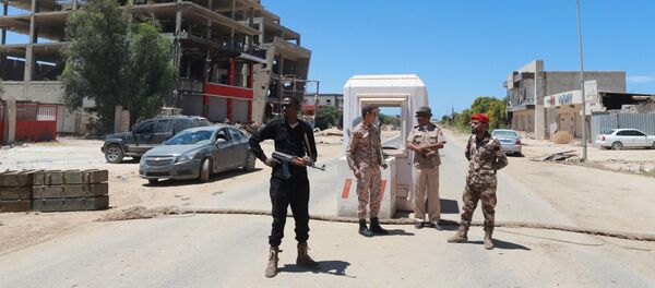 Members for the Libyan Armed Forces stand at the checkpoint in Benghazi, Libya May 16, 2016 Members for the Libyan Armed Forces stand at the checkpoint in Benghazi, Libya May 16, 2016 - Sputnik International