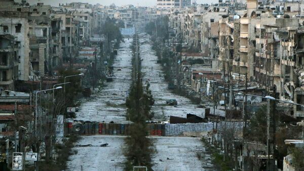 A general view shows a damaged street with sandbags used as barriers in Aleppo's Saif al-Dawla district (File) - Sputnik International