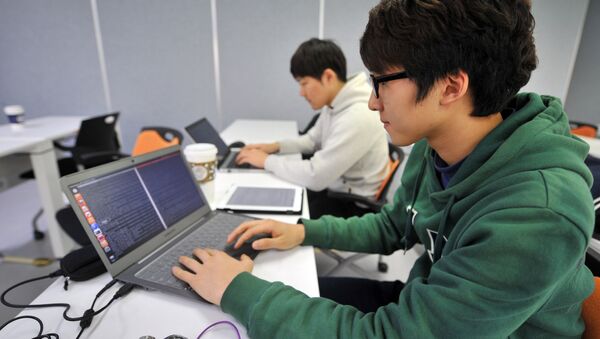 Chang-Won This photo taken on February 14, 2013 shows young computer experts studying at an internet security training centre of the state-run Korea Information Technology Research Institute (KITRI) in Seoul - Sputnik International