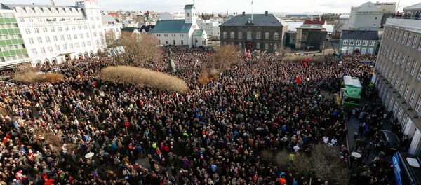 This is a Monday April 4, 2016 file photo of people who gathered to demonstrate against Iceland's prime minister, in Reykjavik. Iceland’s president on Tuesday April 5, 2016, refused a request from the prime minister to dissolve parliament and call a new election amid a dispute over the premier’s offshore tax affairs This is a Monday April 4, 2016 file photo of people who gathered to demonstrate against Iceland's prime minister, in Reykjavik. Iceland’s president on Tuesday April 5, 2016, refused a request from the prime minister to dissolve parliament and call a new election amid a dispute over the premier’s offshore tax affairs - Sputnik International
