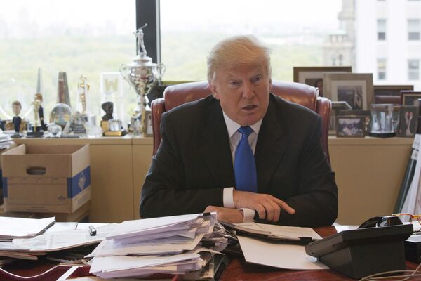 Republican presidential candidate Donald Trump speaks during an interview with The Associated Press in his office at Trump Tower, Tuesday, May 10, 2016, in New York Republican presidential candidate Donald Trump speaks during an interview with The Associated Press in his office at Trump Tower, Tuesday, May 10, 2016, in New York - Sputnik International