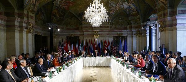 Russian Foreign Minister Sergei Lavrov, center left, U.S. Secretary of State John Kerry, center and United Nations special envoy for Syria Staffan de Mistura, center right, attend the ministerial meeting on Syria in Vienna, Austria, Tuesday, May 17, 2016 - Sputnik International