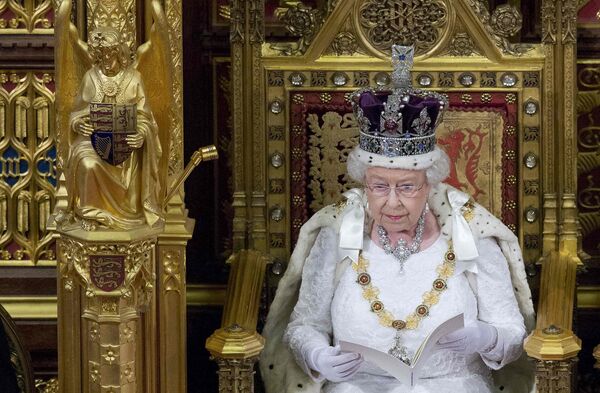 Britain's Queen Elizabeth II delivers the Queen's Speech during the State Opening of Parliament in central London, on May 18, 2016 - Sputnik International
