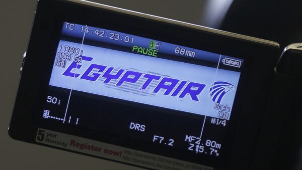 The company logo is displayed on a video camera screen at the Egyptair desk at Charles de Gaulle airport, after an Egyptair flight disappeared from radar during its flight from Paris to Cairo, in Paris, France, May 19, 2016 - Sputnik International