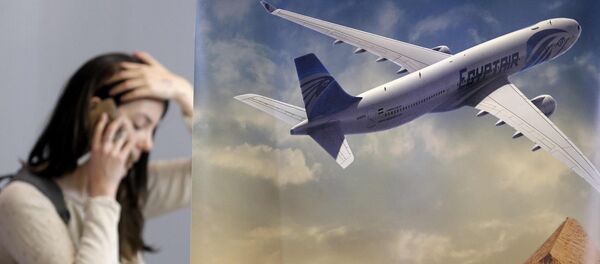 A journalist reports from the Egyptair desk at Charles de Gaulle airport, after an Egyptair flight disappeared from radar during its flight from Paris to Cairo, in Paris, France, May 19, 2016 - Sputnik International