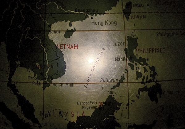 In this May 1, 2016, photo, an illuminated globe shows the South China Sea at a museum in Pathumthani, Thailand In this May 1, 2016, photo, an illuminated globe shows the South China Sea at a museum in Pathumthani, Thailand - Sputnik International