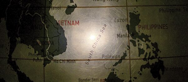 In this May 1, 2016, photo, an illuminated globe shows the South China Sea at a museum in Pathumthani, Thailand - Sputnik International