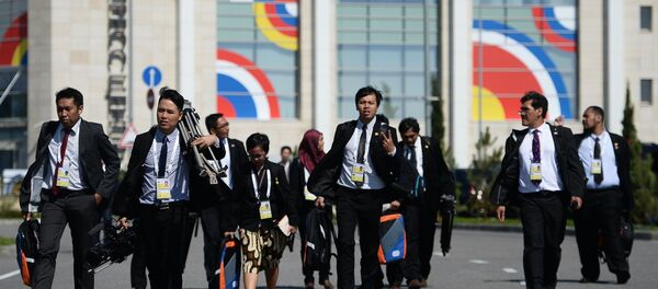 Journalists working at the International Press Centre for the ASEAN-Russia Summit near the congress centre in Sochi Journalists working at the International Press Centre for the ASEAN-Russia Summit near the congress centre in Sochi - Sputnik International