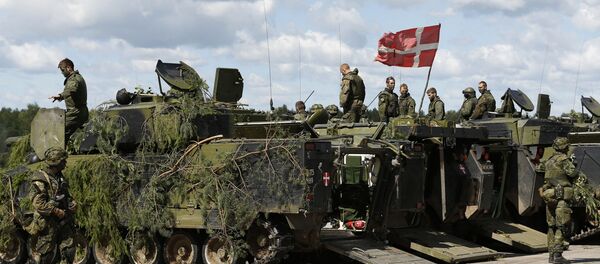 Danish soldiers during a military exercise ' Saber Strike 2014 ' at the Rukla military base some 120 km. (75 miles) west of the capital Vilnius, Lithuania, Tuesday, June 17, 2014 - Sputnik International
