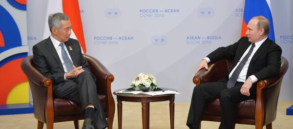 9 May 2016. Russian President Vladimir Putin, right, and Prime Minister of the Republic of Singapore Lee Hsien Loong during a bilateral meeting at Radisson Blu Resort & Congress Centre in Sochi held as part of the ASEAN-Russia Summit - Sputnik International