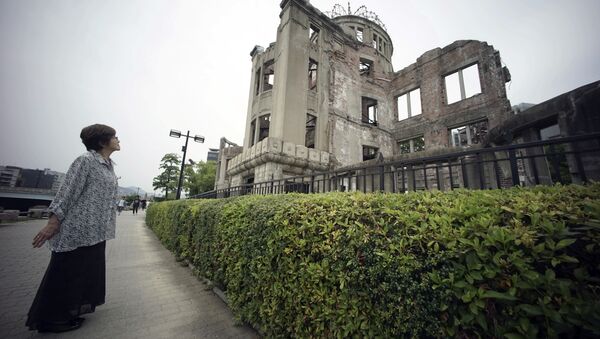 Kimie Mihara, a survivor of the 1945 atomic bombing, looks at the Atomic Bomb Dome, as it is known today in Hiroshima. - Sputnik International