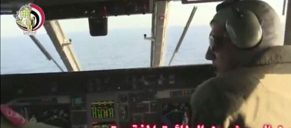 Pilots of an Egyptian military plane take part in a search operation for the EgyptAir plane that disappeared in the Mediterranean Sea in this still image taken from video May 19, 2016. Pilots of an Egyptian military plane take part in a search operation for the EgyptAir plane that disappeared in the Mediterranean Sea in this still image taken from video May 19, 2016. - Sputnik International