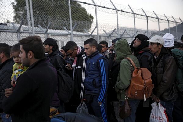 Refugees and migrants wait to be registered at the Moria refugee camp on the Greek island of Lesbos, November 5, 2015. Refugees and migrants wait to be registered at the Moria refugee camp on the Greek island of Lesbos, November 5, 2015. - Sputnik International
