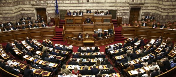 Greece's Prime Minister Alexis Tsipras addresses lawmakers during a parliamentary session in Athens. Greece's Prime Minister Alexis Tsipras addresses lawmakers during a parliamentary session in Athens. - Sputnik International