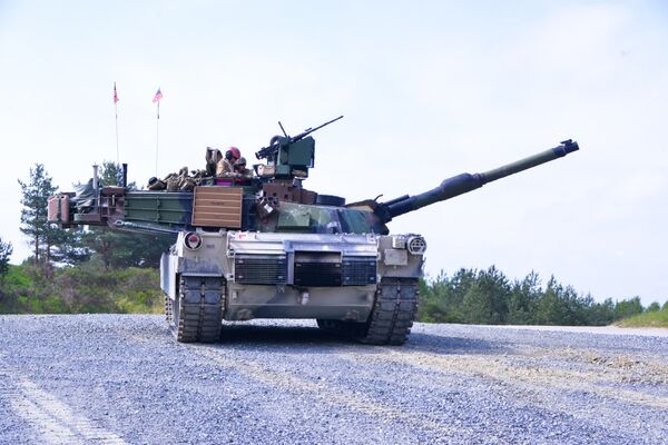 U.S. Soldiers, assigned to the 3rd Infantry Division, prepare to move to their next battle position. U.S. Soldiers, assigned to the 3rd Infantry Division, prepare to move to their next battle position. - Sputnik International