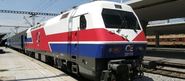 Siemens-Henschel HellasSprinter electric locomotive 120-016 of OSE enters Thessaloniki New Passenger Station Siemens-Henschel HellasSprinter electric locomotive 120-016 of OSE enters Thessaloniki New Passenger Station - Sputnik International