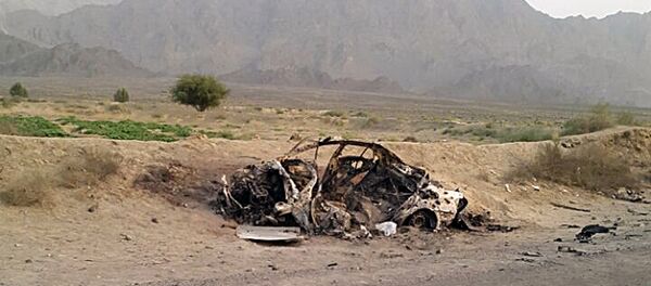 This photo taken by a freelance photographer Abdul Salam Khan using his smart phone on Sunday, May 22, 2016, purports to show the destroyed vehicle in which Mullah Mohammad Akhtar Mansour was traveling in the Ahmad Wal area in Baluchistan province of Pakistan, near Afghanistan's border. - Sputnik International