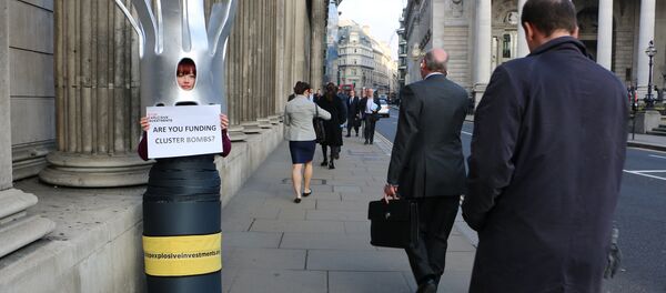 A campaigner dressed as a cluster bomb in London, UK. A campaigner dressed as a cluster bomb in London, UK. - Sputnik International