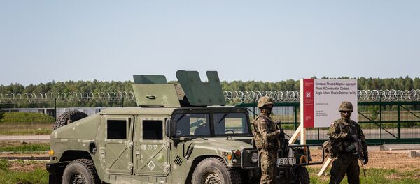 Soldiers stand guard during ground breaking ceremony of the northern section of defence anti-missile shield in Redzikowo military base in northern Poland Soldiers stand guard during ground breaking ceremony of the northern section of defence anti-missile shield in Redzikowo military base in northern Poland - Sputnik International