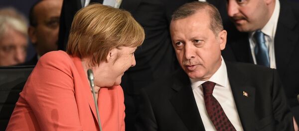 German Chancellor Angela Merkel (L) chats with Turkish President Tayyip Erdogan during the World Humanitarian Summit in Istanbul, Turkey, May 23, 2016. German Chancellor Angela Merkel (L) chats with Turkish President Tayyip Erdogan during the World Humanitarian Summit in Istanbul, Turkey, May 23, 2016. - Sputnik International