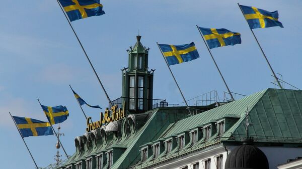 Swedish flags above the Grand Hotel, Blasieholmen, Stockholm, Sweden - Sputnik International