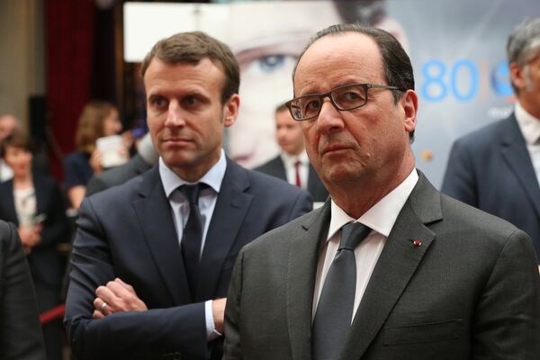 French Economy Minister Emmanuel Macron (L) alongside President Francois Hollande (R). File photo. French Economy Minister Emmanuel Macron (L) alongside President Francois Hollande (R). File photo. - Sputnik International