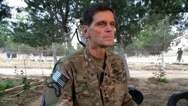Army Gen. Joseph Votel speaks to reporters Saturday, May 21, 2016 during a secret trip to Syria - Sputnik International