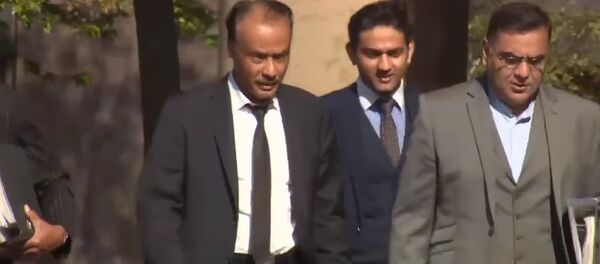 Mohammed Zaman (L) - Sputnik International