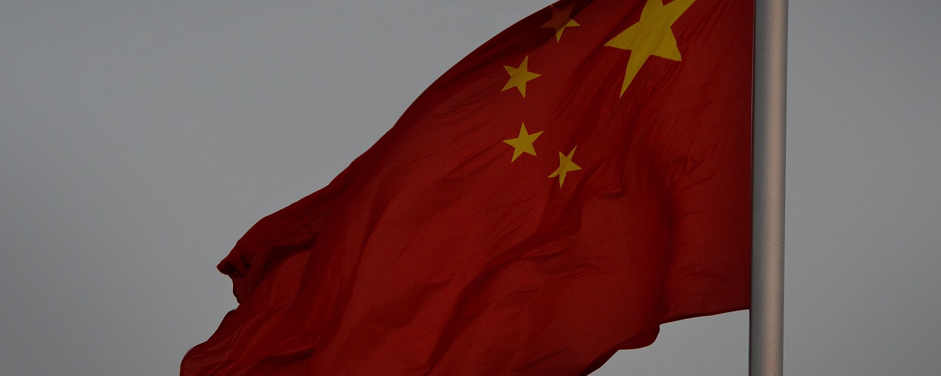 The Chinese flag is seen in front of a view of the moon at Tiananmen Square in Beijing on December 13, 2013 - Sputnik International, 1920, 30.06.2022