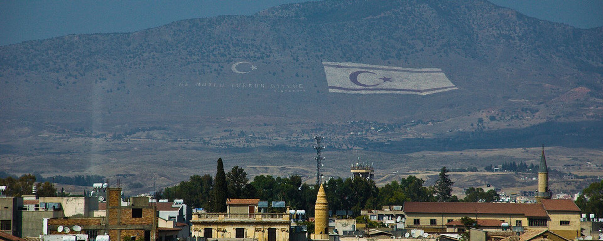 Flag of the self-declared Turkish Republic of Northern Cyprus in the hills above Cyprus' capital Nicosia. - Sputnik International, 1920, 21.07.2021