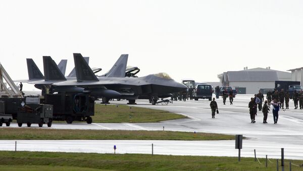US Air Force's new stealth fighters F-22A Raptor (L) are lined up at the Kadena US Air Base, in Kadena town (File) - Sputnik International