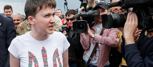 Ukrainian servicewoman Nadiya Savchenko talks to the media upon her arrival at Boryspil International airport outside Kiev, Ukraine, May 25, 2016 Ukrainian servicewoman Nadiya Savchenko talks to the media upon her arrival at Boryspil International airport outside Kiev, Ukraine, May 25, 2016 - Sputnik International
