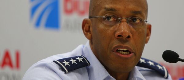 Lieutenant General Charles Q Brown, commander of the United States Air Forces Central Command, Southwest Asia, speaks during a joint press conference with US Secretary of the Air Force Deborah Lee James at the Dubai Airshow on November 10, 2015 - Sputnik International