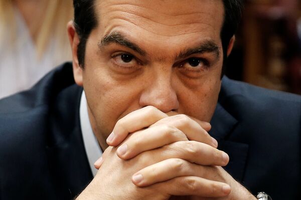 Greek Prime Minister Alexis Tsipras looks on before a ruling Syriza party parliamentary group session in Athens, Greece, May 6, 2016. Greek Prime Minister Alexis Tsipras looks on before a ruling Syriza party parliamentary group session in Athens, Greece, May 6, 2016. - Sputnik International
