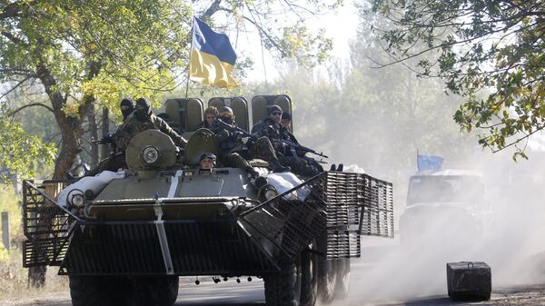 Ukrainian troops patrol in armored vehicles (File) - Sputnik International