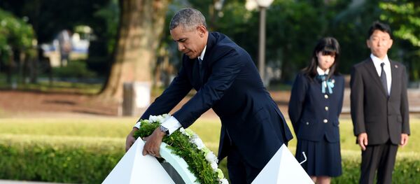 US President Barack Obama places a wreath at the cenotaph in the Peace Momorial park in Hiroshima on May 27, 2016 with Japanese Prime Minister Shinzo Abe. Obama on May 27 paid a moving tribute to victims of the world's first nuclear attack US President Barack Obama places a wreath at the cenotaph in the Peace Momorial park in Hiroshima on May 27, 2016 with Japanese Prime Minister Shinzo Abe. Obama on May 27 paid a moving tribute to victims of the world's first nuclear attack - Sputnik International
