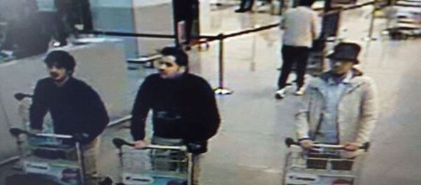 In this image provided by the Belgian Federal Police in Brussels on Tuesday, March 22, 2016, three men who are suspected of taking part in the attacks at Belgium's Zaventem Airport and are being sought by police In this image provided by the Belgian Federal Police in Brussels on Tuesday, March 22, 2016, three men who are suspected of taking part in the attacks at Belgium's Zaventem Airport and are being sought by police - Sputnik International