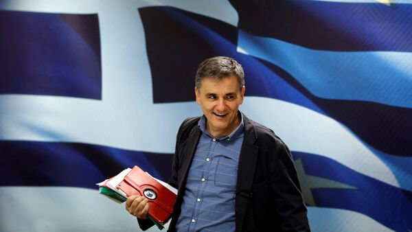 Greek Finance Minister Euclid Tsakalotos arrives for a news conference at the ministry in Athens, Greece May 26, 2016 - Sputnik International