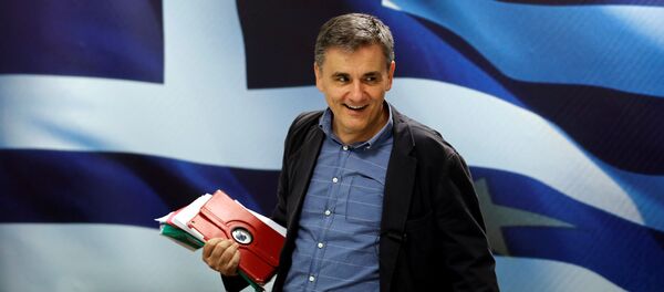 Greek Finance Minister Euclid Tsakalotos arrives for a news conference at the ministry in Athens, Greece May 26, 2016 Greek Finance Minister Euclid Tsakalotos arrives for a news conference at the ministry in Athens, Greece May 26, 2016 - Sputnik International