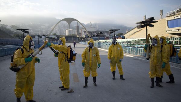 In this Tuesday, Jan. 26, 2016 file photo, health workers get ready to spray insecticide to combat the Aedes aegypti mosquitoes that transmits the Zika virus, under the bleachers of the Sambadrome in Rio de Janeiro, which will be used for the Archery competition in the 2016 summer games - Sputnik International