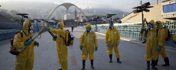 In this Tuesday, Jan. 26, 2016 file photo, health workers get ready to spray insecticide to combat the Aedes aegypti mosquitoes that transmits the Zika virus, under the bleachers of the Sambadrome in Rio de Janeiro, which will be used for the Archery competition in the 2016 summer games - Sputnik International