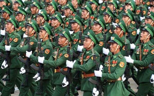 Soldiers parade in front of the mausoleum of late president Ho Chi Minh, founder of today's communist Vietnam, as the communist regime celebrates its 70th anniversary in Hanoi on September 2, 2015. Soldiers parade in front of the mausoleum of late president Ho Chi Minh, founder of today's communist Vietnam, as the communist regime celebrates its 70th anniversary in Hanoi on September 2, 2015. - Sputnik International