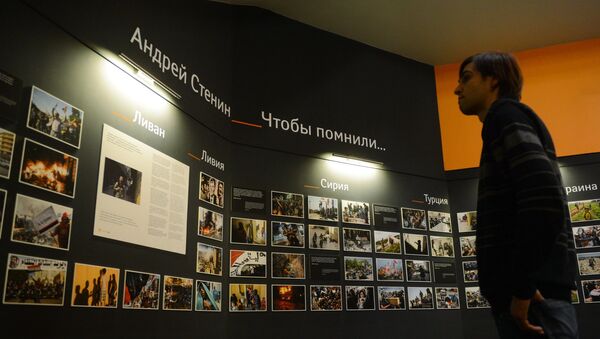 Photographic exhibition of MIA Rossiya Segodnya news agency photo correspondent Andrei Stenin killed in Ukraine on professional duty. - Sputnik International