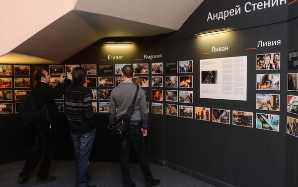 Photographic exhibition of MIA Rossiya Segodnya news agency photo correspondent Andrei Stenin killed in Ukraine on professional duty. - Sputnik International