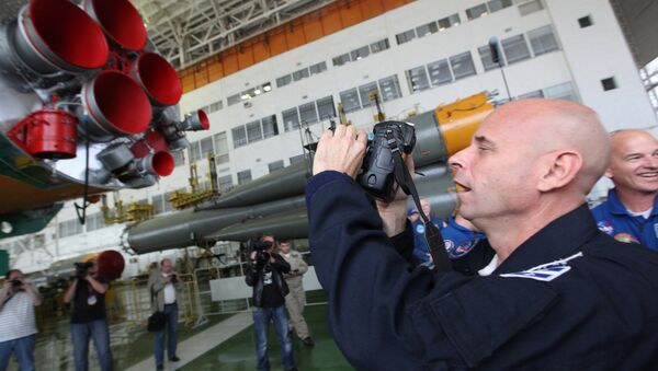 Space tourist Guy Laliberte of the 21st ISS mission main crew seen at a maintenance and checkout facility at the Baikonur Space Center. File photo - Sputnik International