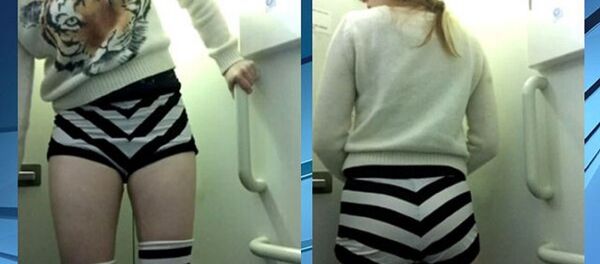 Burlesque Dancer ‘Maggie Muffin’ Told to Put on Some Clothes to Fly - Sputnik International