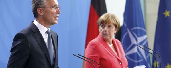 German Chancellor Angela Merkel and NATO Secretary-General Jens Stoltenberg attend a news conference following talks at the Chancellery in Berlin, Germany, June 2, 2016. - Sputnik International